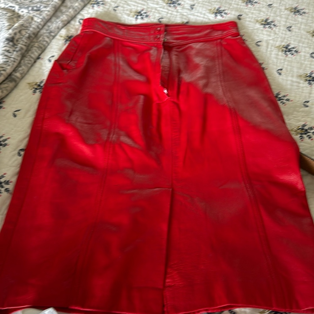 Beautiful red pencil mid skirt, totally lined and in perfect condition.